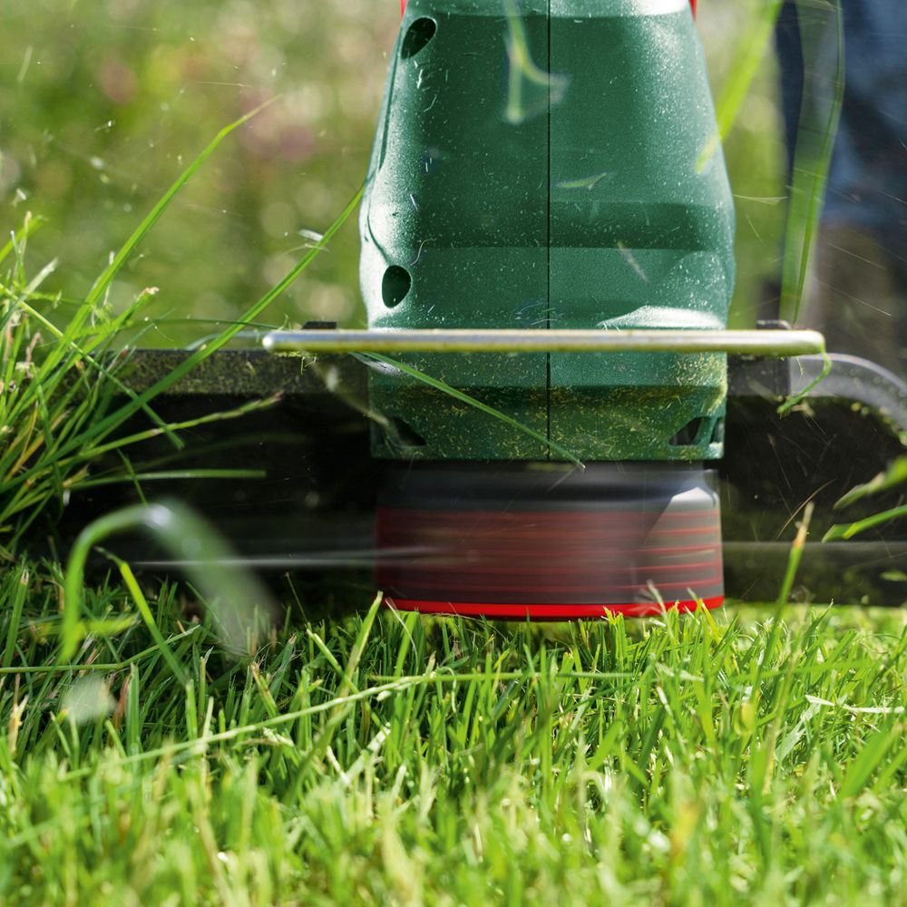 Bosch UniversalGrassCut batteridriven trimmer 18V-23-450 Solo + extra spole