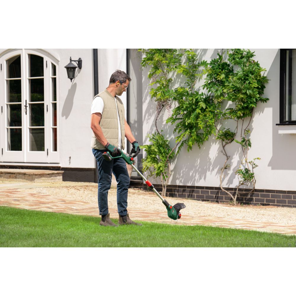 Bosch UniversalGrassCut batteridriven trimmer 18V-23-450 Solo + extra spole